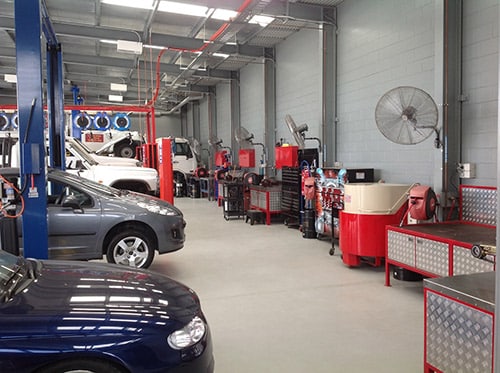 Cars in workshop being serviced - MB Automotive
